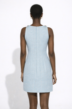 Light blue checkered dress worn by a model on a white background