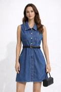 Woman wearing a blue denim dress with a belt on a white background 90s style bag