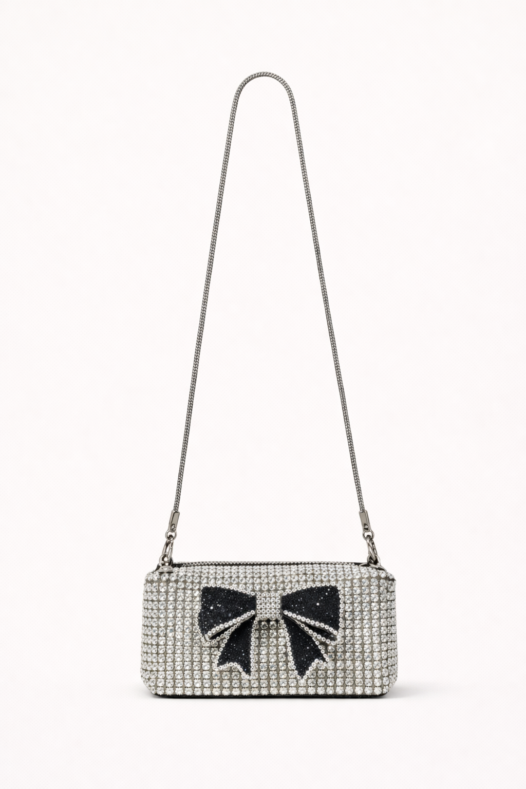 Handbag with a decorative bow on a white background