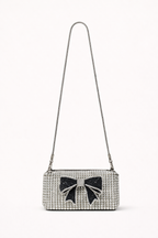 Handbag with a decorative bow on a white background