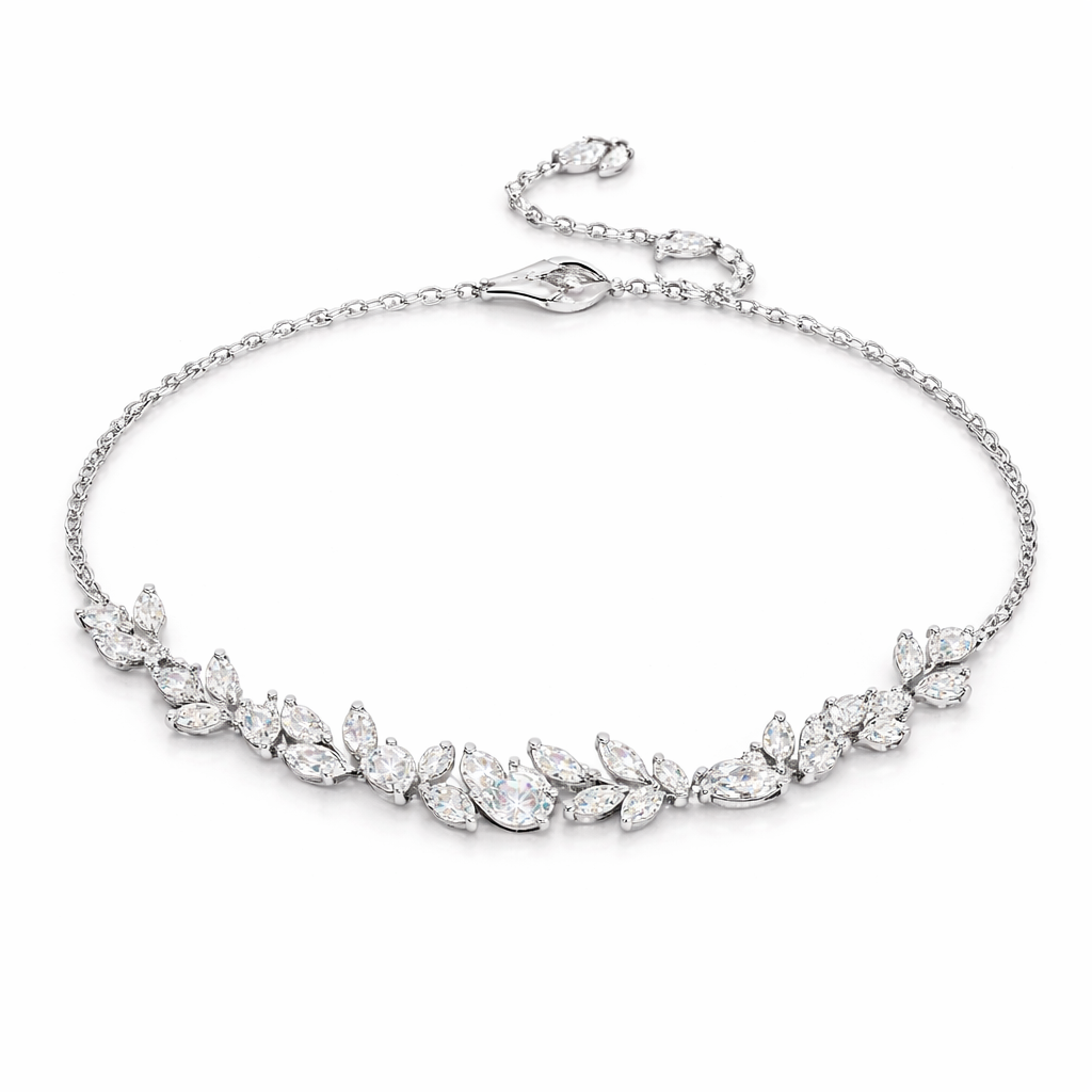Silver bracelet with leaf-shaped crystals on a white background wisteria leaves