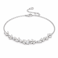 Silver bracelet with leaf-shaped crystals on a white background wisteria leaves