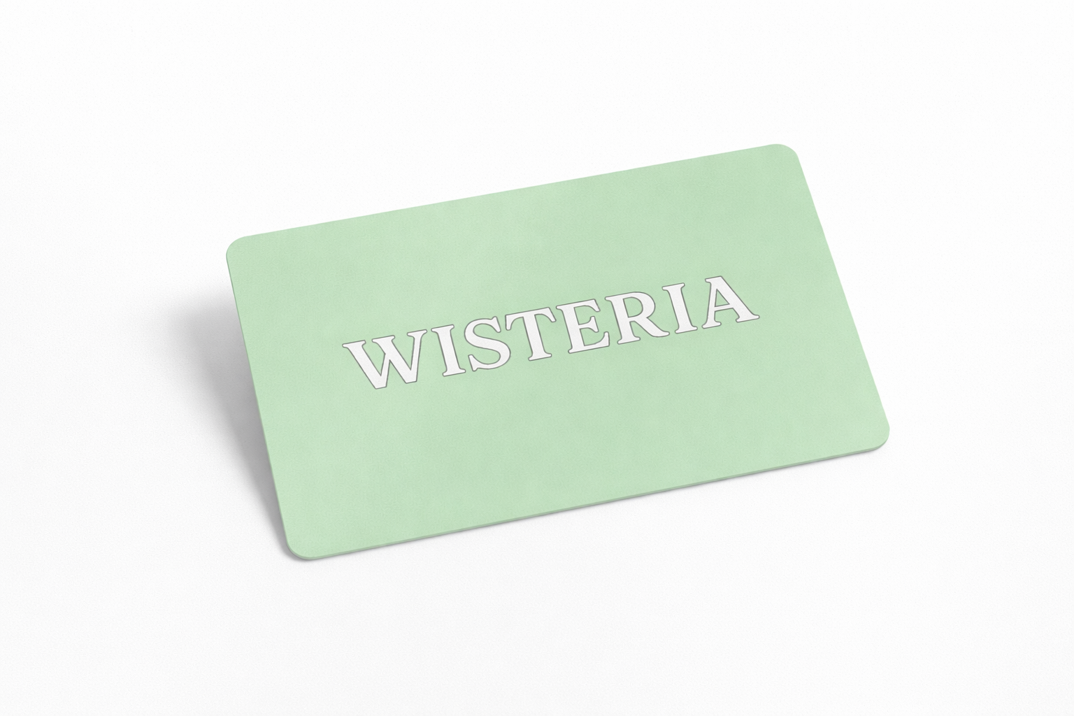 Light green card with 'Wisteria' text on a white background fashion women dresses