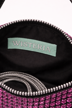 Pink embellished bag with a visible 'Wisteria' brand label on a white background rhinestone pink evening bag